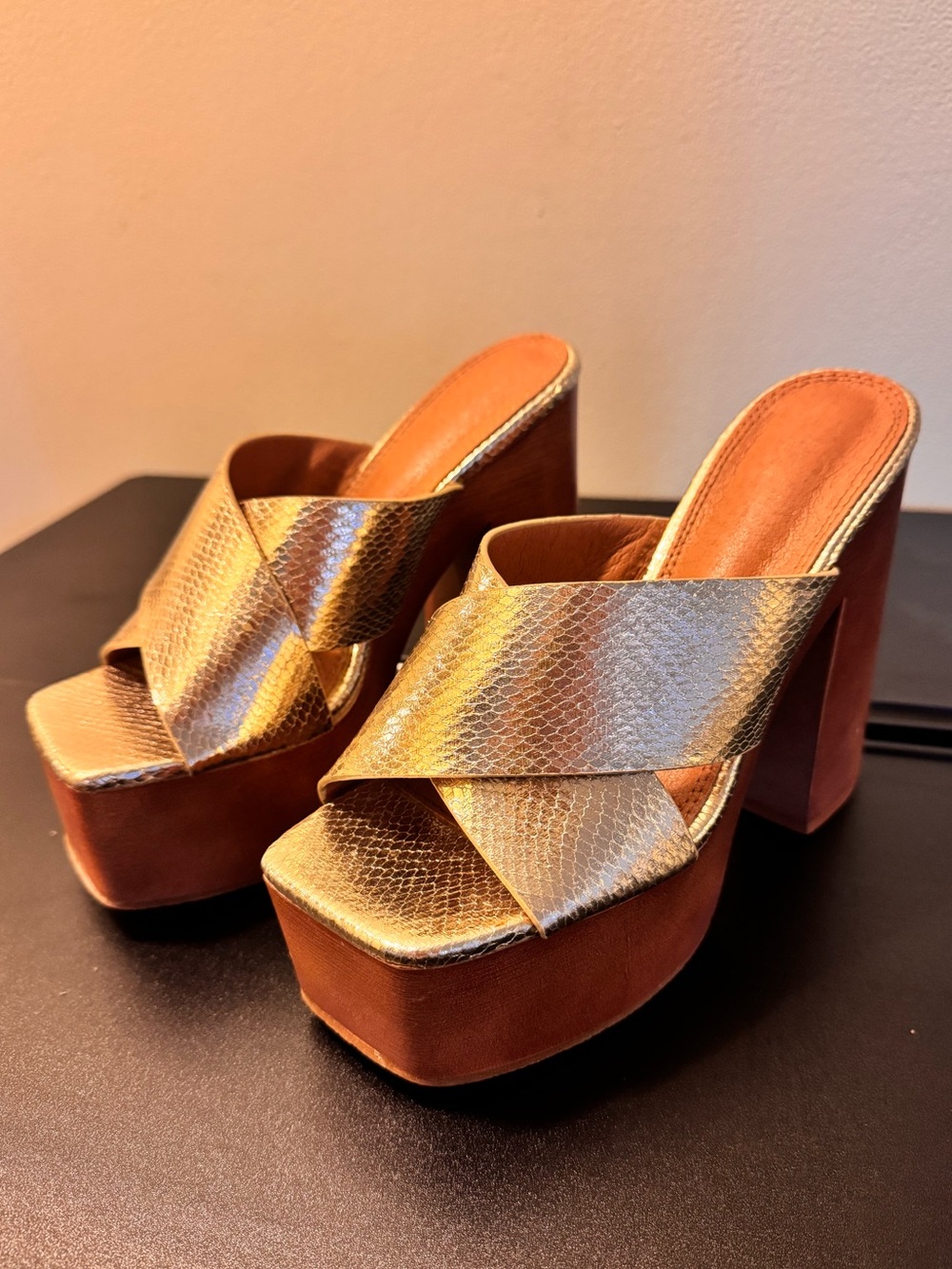 Metallic faux snakeskin gold and faux wood platform sandals